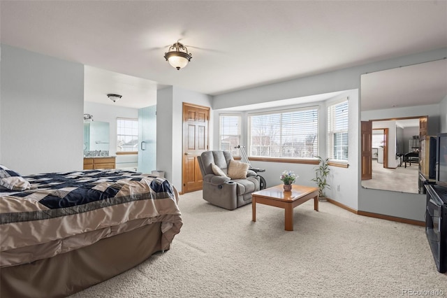 bedroom featuring light colored carpet