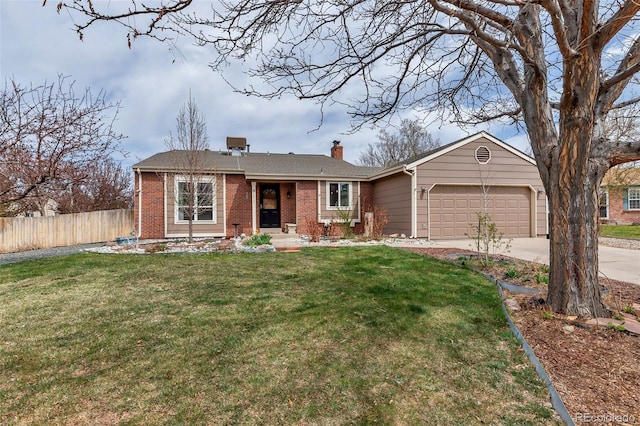 ranch-style house featuring a garage and a front lawn