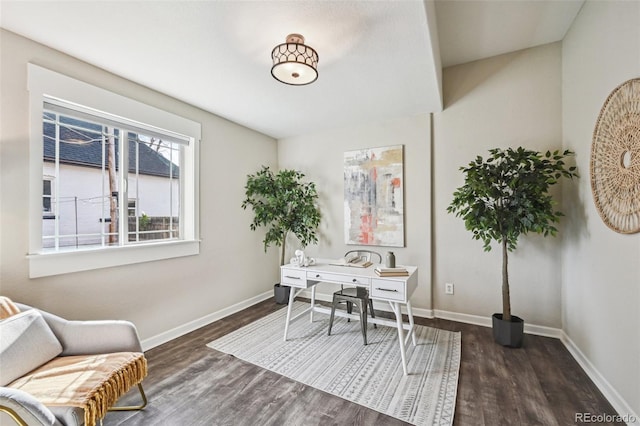 office space featuring wood finished floors and baseboards