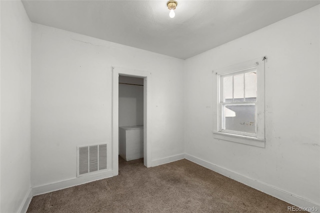 unfurnished bedroom with carpet floors