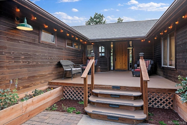 26452 Wolverine Trl, Evergreen, CO 80439 - wooden deck featuring a garden