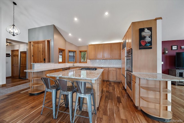 26452 Wolverine Trl, Evergreen, CO 80439 - kitchen with open shelves, a sink, dark wood-style flooring, a breakfast bar, and high vaulted ceiling