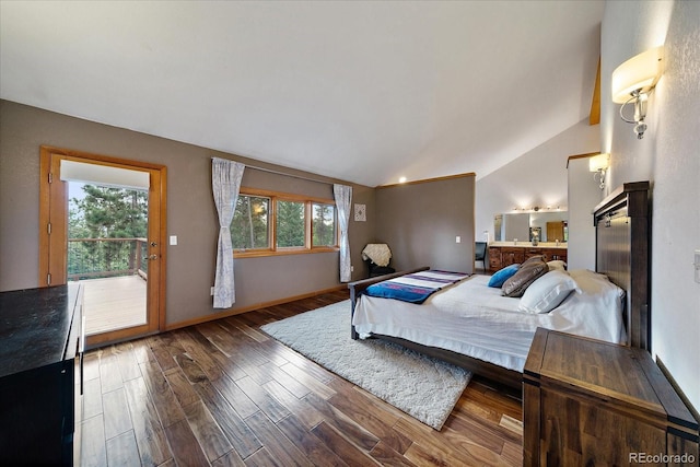 26452 Wolverine Trl, Evergreen, CO 80439 - bedroom with lofted ceiling and wood finished floors