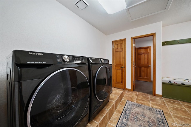 26452 Wolverine Trl, Evergreen, CO 80439 - laundry room featuring separate washer and dryer and attic access