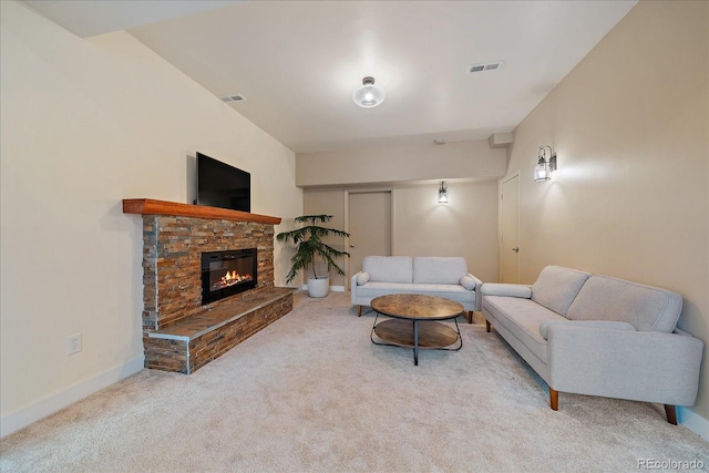 26452 Wolverine Trl, Evergreen, CO 80439 - living room featuring carpet floors, a fireplace, and baseboards
