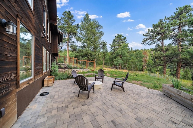 26452 Wolverine Trl, Evergreen, CO 80439 - view of patio featuring a view of trees