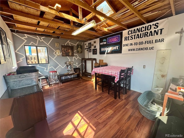 dining space featuring wood finished floors