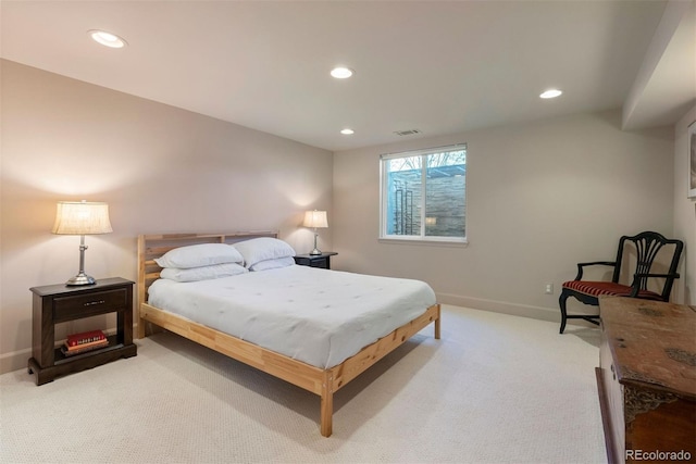 bedroom with recessed lighting, visible vents, and light colored carpet