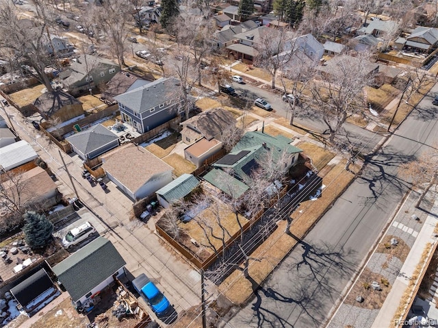 birds eye view of property with a residential view