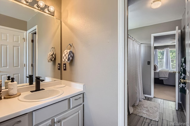 10330 Lions Path, Lone Tree, CO 80124 - full bathroom with vanity, ensuite bath, and a shower with curtain