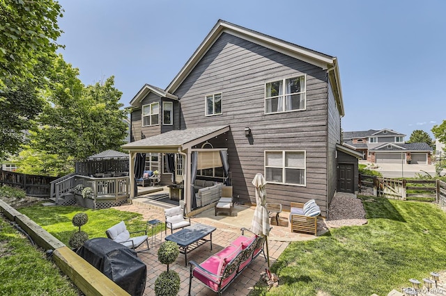 10330 Lions Path, Lone Tree, CO 80124 - back of property with outdoor lounge area, a deck, and a patio area