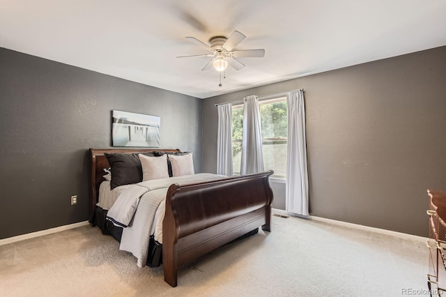 10330 Lions Path, Lone Tree, CO 80124 - bedroom with light colored carpet, baseboards, and a ceiling fan