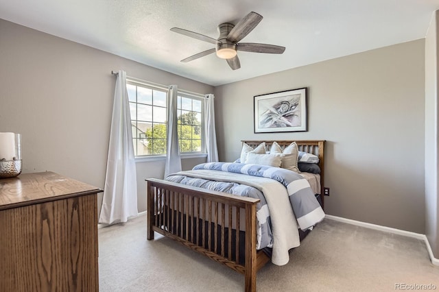 10330 Lions Path, Lone Tree, CO 80124 - bedroom featuring light carpet, baseboards, and ceiling fan