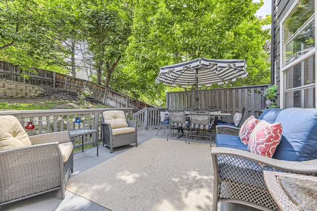 10330 Lions Path, Lone Tree, CO 80124 - fenced backyard with outdoor dining area, a deck, and outdoor lounge area