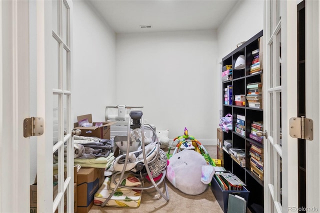 storage featuring visible vents and french doors
