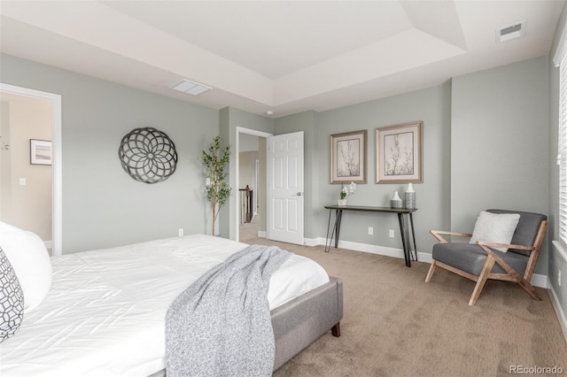 676 Fossil Bed Cir, Erie, CO 80516 - bedroom with light colored carpet, baseboards, and a raised ceiling