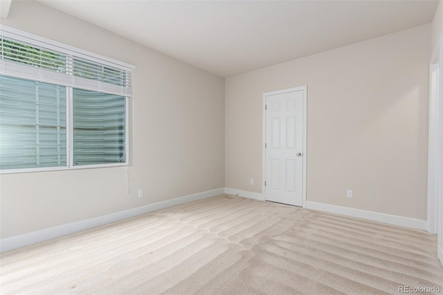 676 Fossil Bed Cir, Erie, CO 80516 - spare room featuring carpet flooring and baseboards