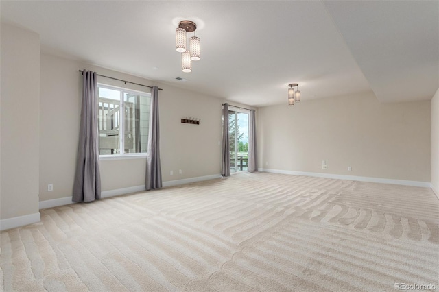 676 Fossil Bed Cir, Erie, CO 80516 - empty room with light colored carpet and baseboards