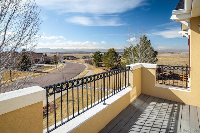 balcony featuring a mountain view