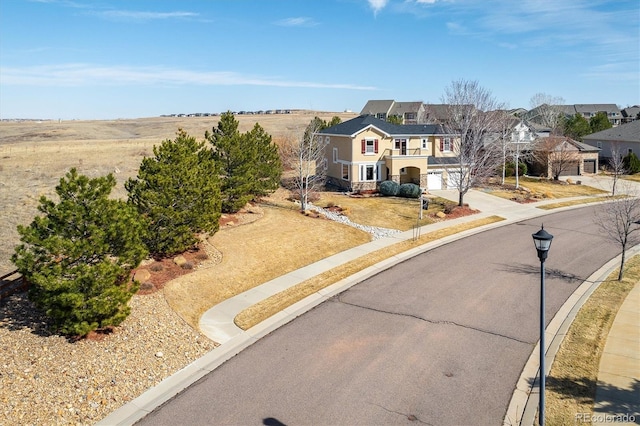 view of front of home featuring a garage and driveway