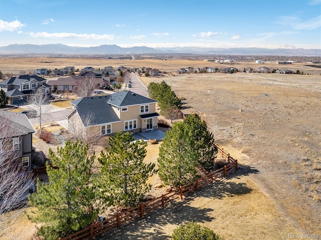 bird's eye view with a residential view and a mountain view