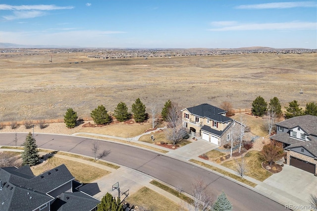 drone / aerial view with a desert view