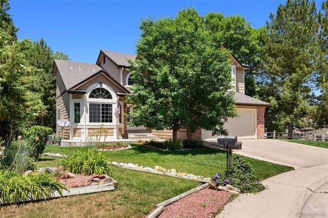 1473 E 130th Dr, Thornton, CO 80241 - view of property hidden behind natural elements with driveway, brick siding, a front yard, and roof with shingles