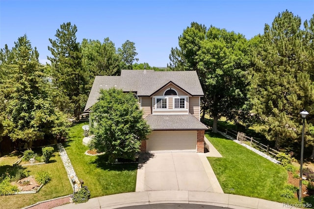 1473 E 130th Dr, Thornton, CO 80241 - view of front of property featuring concrete driveway, brick siding, an attached garage, and a shingled roof