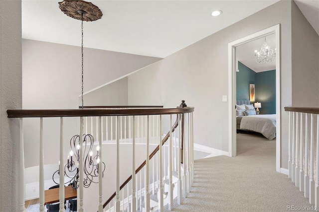 1473 E 130th Dr, Thornton, CO 80241 - hallway with a chandelier, carpet floors, an upstairs landing, and recessed lighting