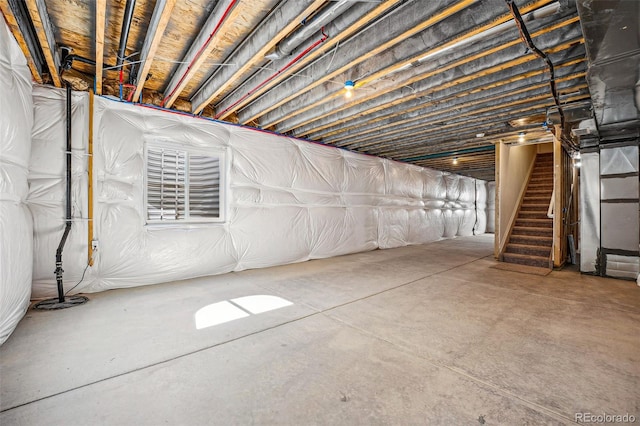 unfinished basement with stairway