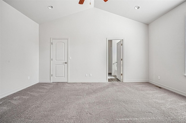 unfurnished room featuring carpet floors, baseboards, visible vents, and a ceiling fan