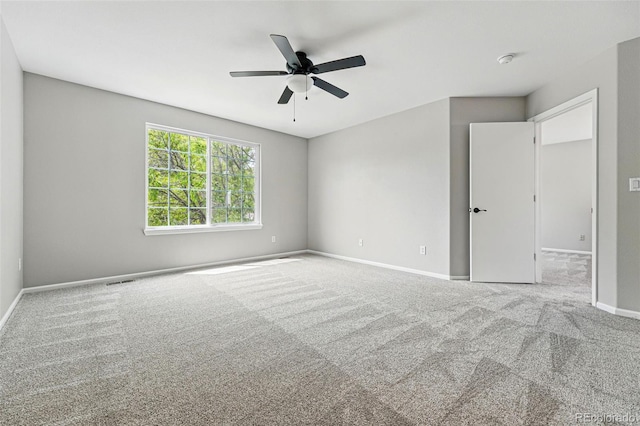 1248 Button Rock Dr, Longmont, CO 80504 - unfurnished bedroom with carpet flooring, baseboards, and a ceiling fan