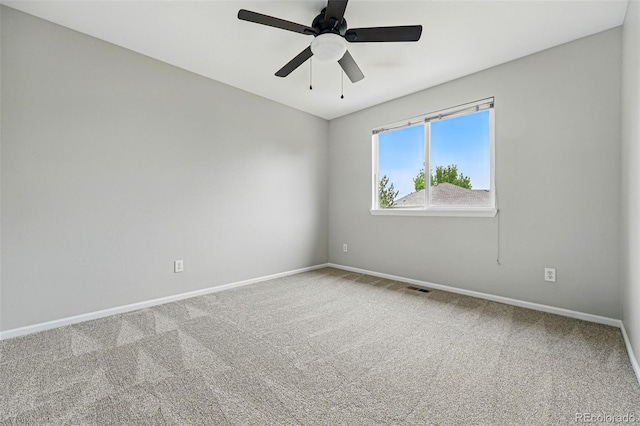 1248 Button Rock Dr, Longmont, CO 80504 - carpeted spare room featuring baseboards and ceiling fan