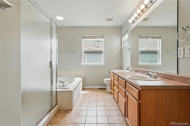 1248 Button Rock Dr, Longmont, CO 80504 - bathroom with a shower stall, double vanity, a garden tub, tile patterned flooring, and toilet
