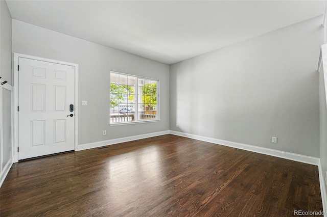 1248 Button Rock Dr, Longmont, CO 80504 - spare room with dark wood-style flooring and baseboards