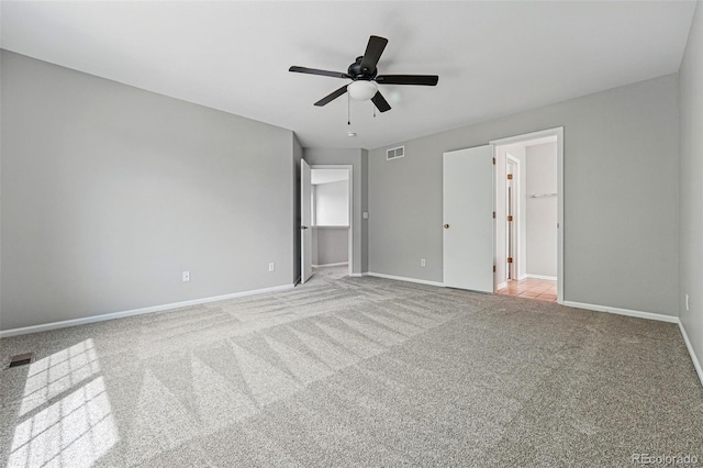 1248 Button Rock Dr, Longmont, CO 80504 - unfurnished bedroom featuring carpet floors, baseboards, and a ceiling fan