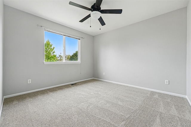 1248 Button Rock Dr, Longmont, CO 80504 - unfurnished room with carpet floors, baseboards, and a ceiling fan