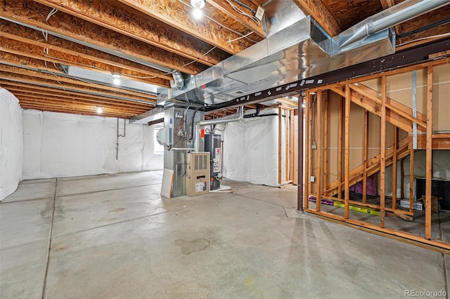 1248 Button Rock Dr, Longmont, CO 80504 - unfinished basement featuring water heater and heating unit