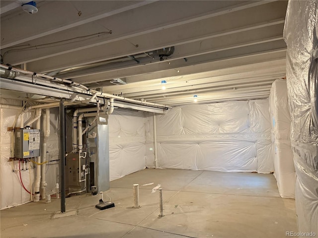 basement featuring water heater