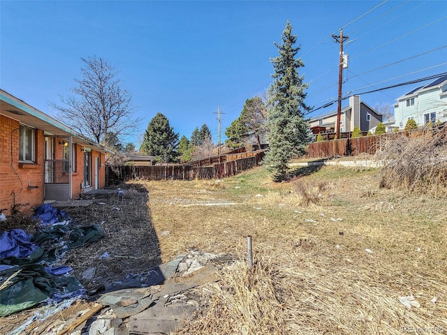 view of yard with fence