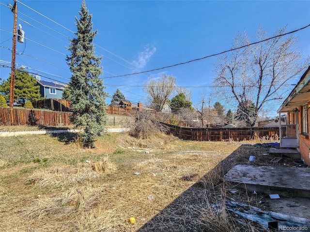 view of yard with fence