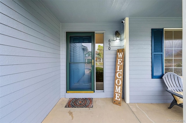 entrance to property with a porch