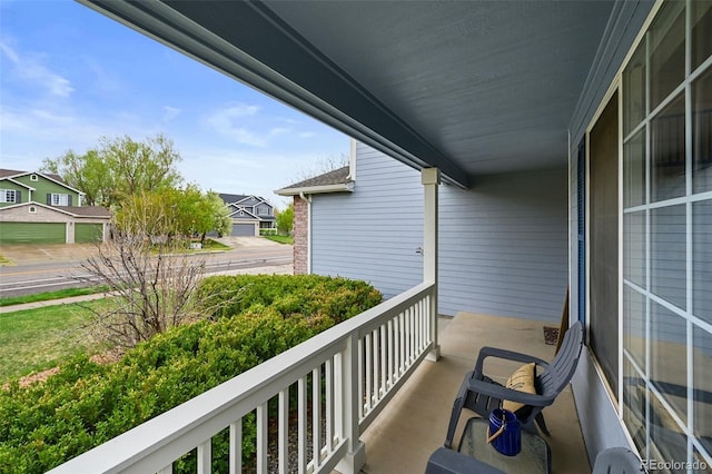 balcony featuring a residential view