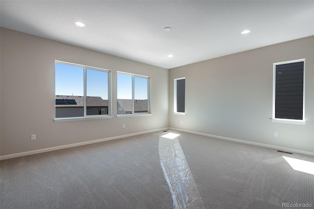 empty room with carpet floors