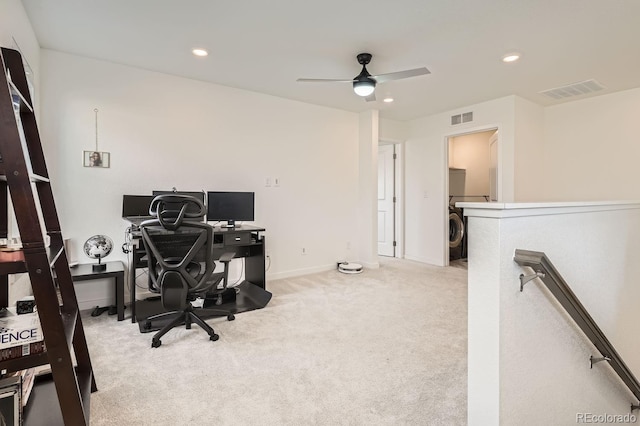 carpeted home office with ceiling fan