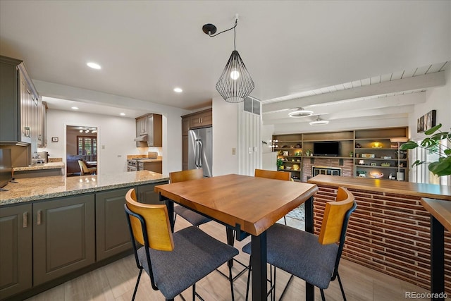 1040 N Kearney St, Denver, CO 80220 - dining area with light wood-style flooring and recessed lighting