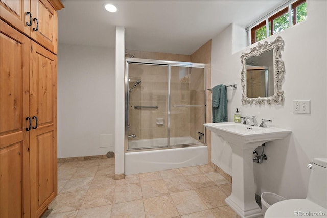 1040 N Kearney St, Denver, CO 80220 - bathroom with enclosed tub / shower combo and recessed lighting