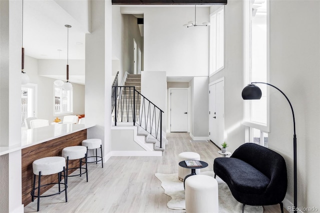 foyer entrance with light hardwood / wood-style floors