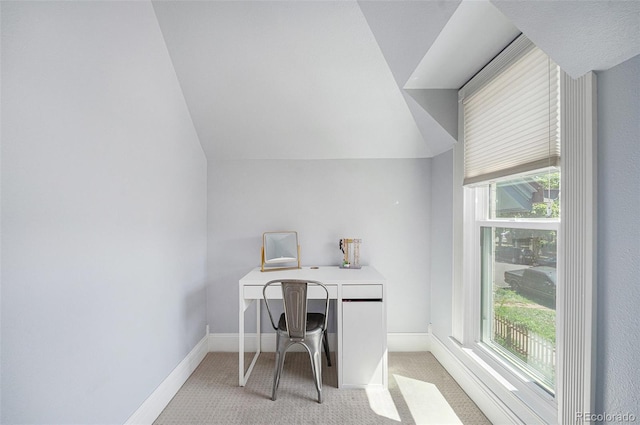 2831 N Humboldt St, Denver, CO 80205 - home office with light colored carpet, healthy amount of natural light, and lofted ceiling