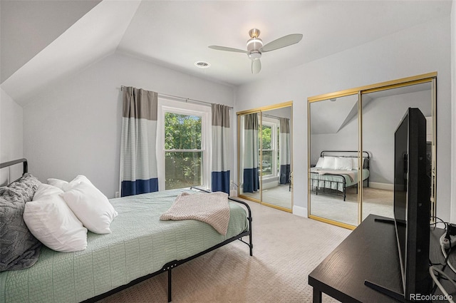 2831 N Humboldt St, Denver, CO 80205 - carpeted bedroom featuring multiple closets, vaulted ceiling, and ceiling fan